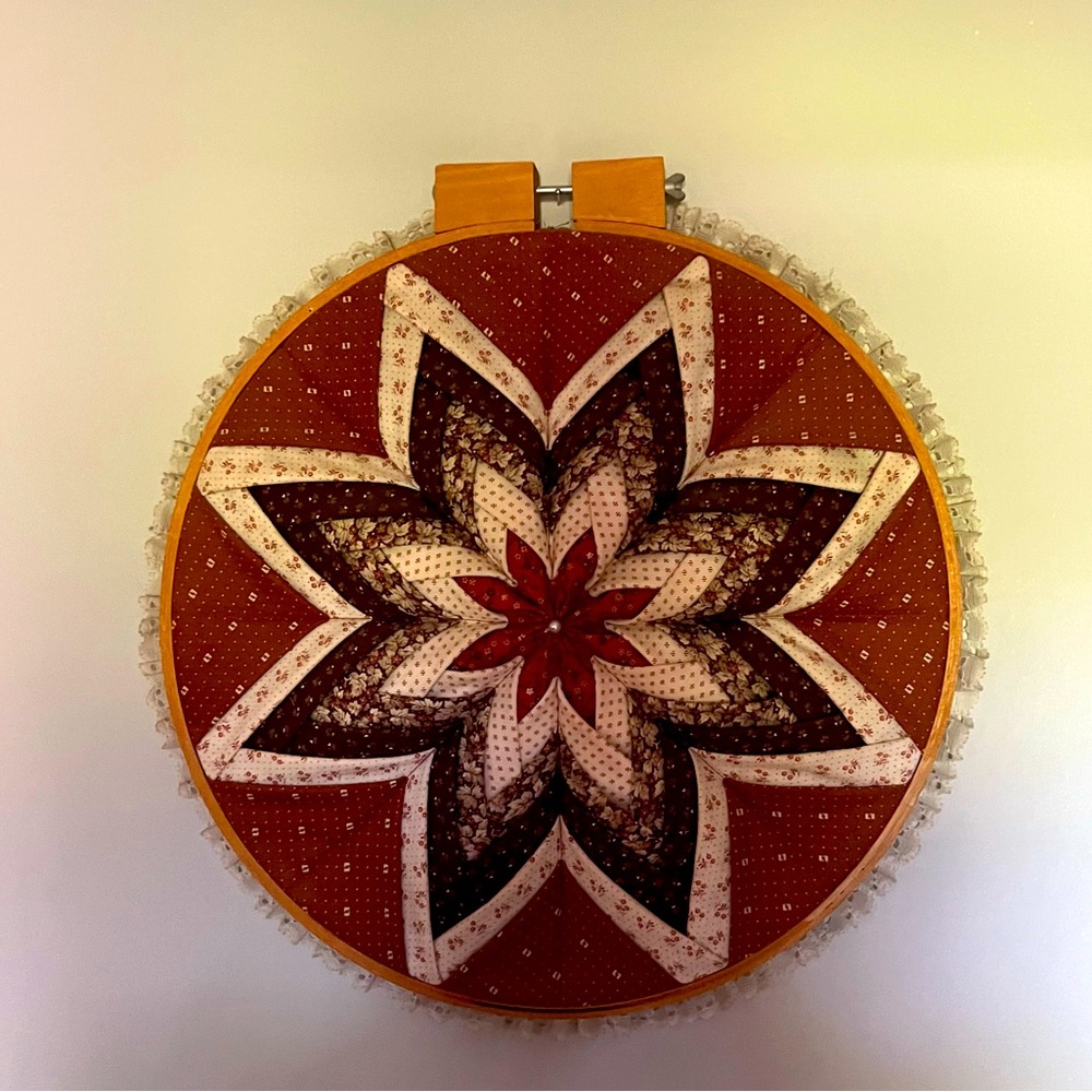Vintage quilt wreath with wooden edge. Great for country home.